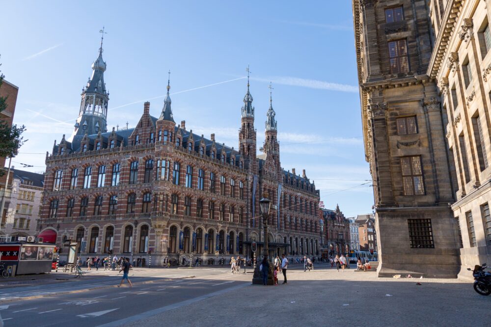 Amsterdam city hall exterior with bicycles, Dutch municipal building, daytime