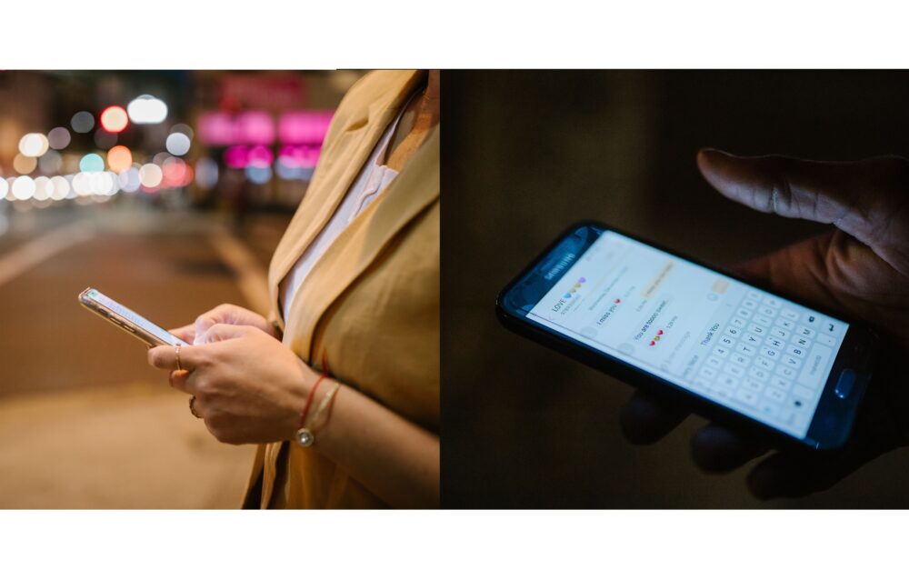 A person in Taipei using a smartphone messaging app at night, city lights in background, close-up of hands and screen